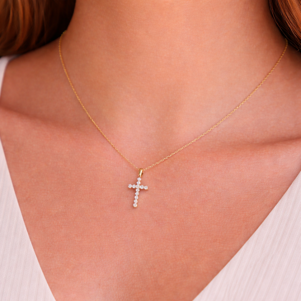 Diamond cross pendant necklace close-up detail