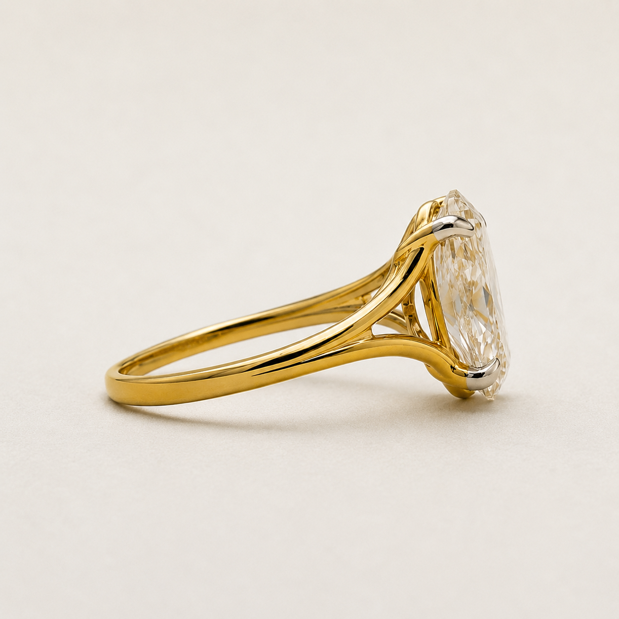 Split shank oval diamond solitaire ring, full band view
